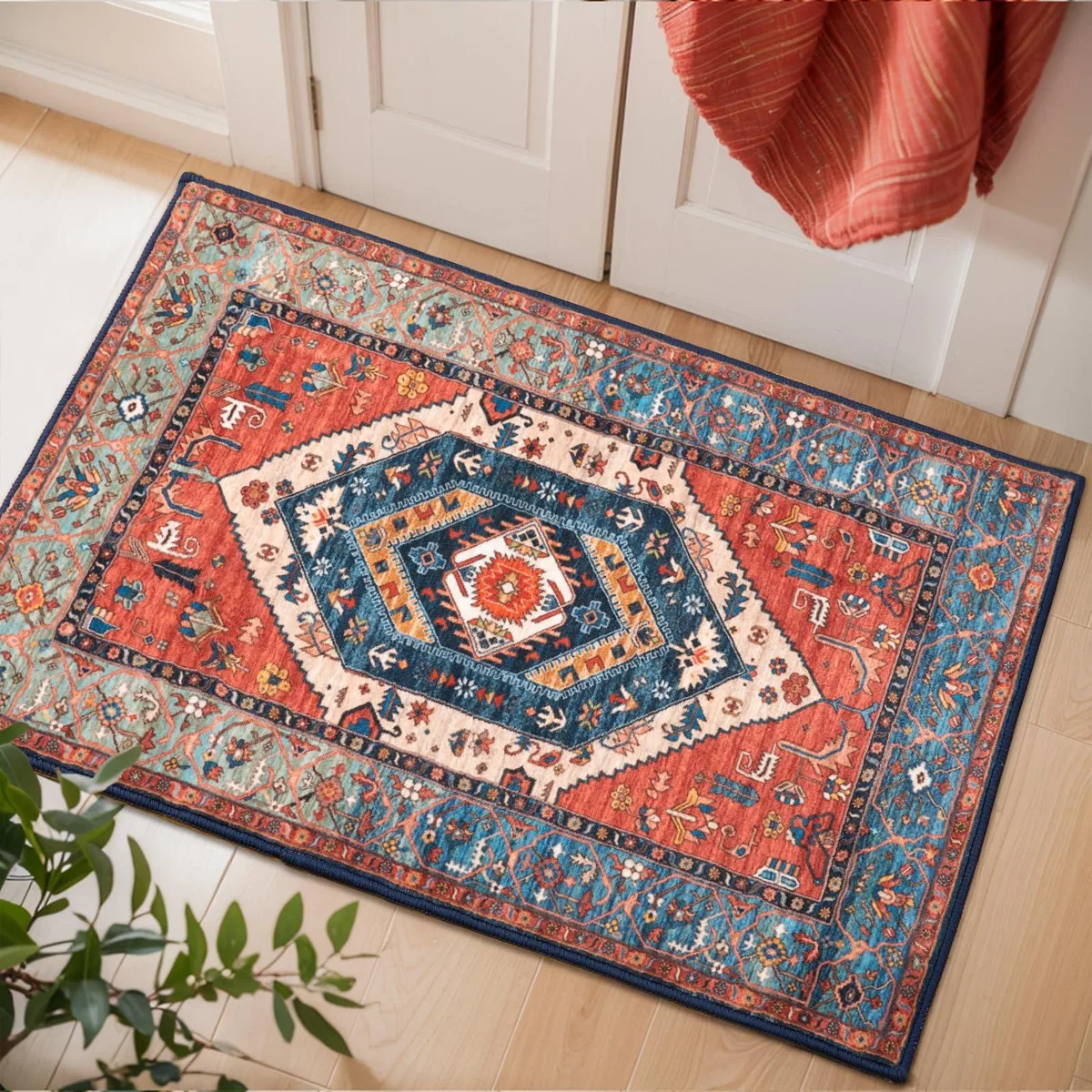 Rectangular rust-coloured polyester runner with vintage medallion pattern and non-slip backing