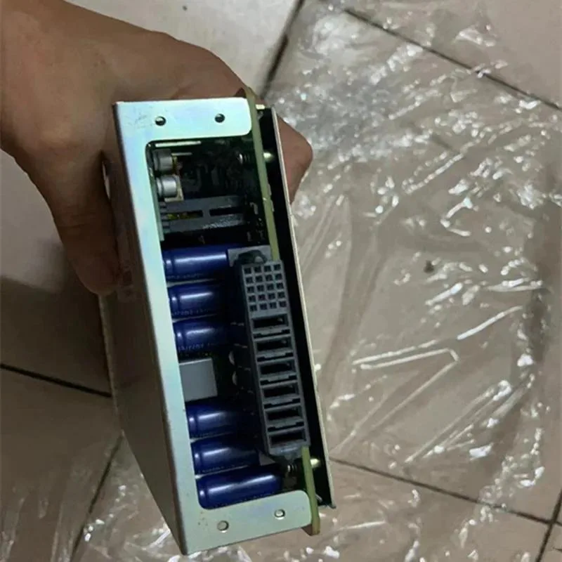 Rectangular ATX power supply unit in matte black finish with cooling fan visible