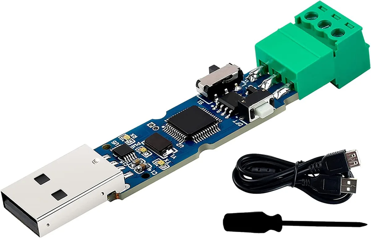 Small green PCB with USB-A plug and screw terminals, STM32F103 chip visible