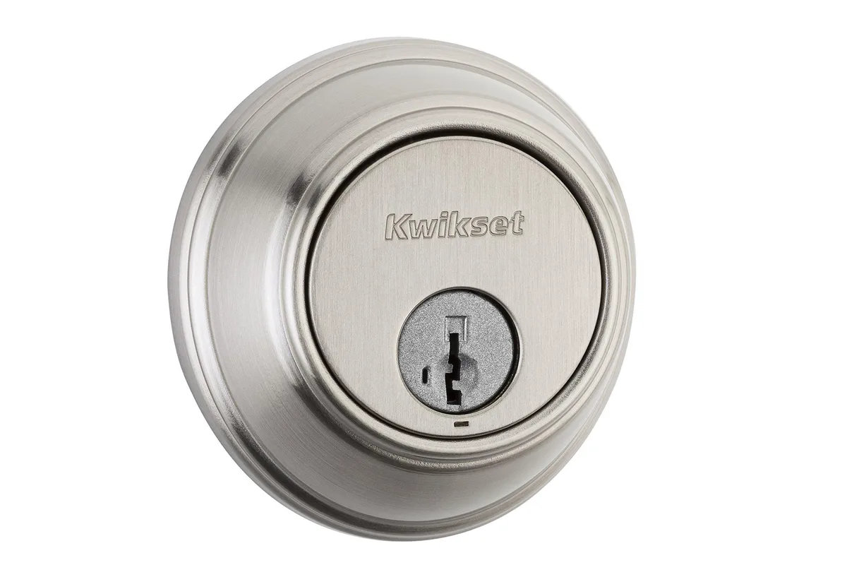 Twelve satin nickel deadbolt locks in a box, each with round exterior cylinder and interior turn piece