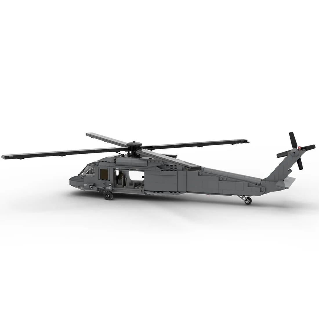 Colourful plastic building bricks forming a helicopter model with rotor blades and landing skids