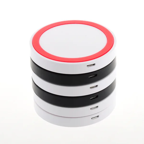 Compact red and white wireless charging pad with Micro USB input