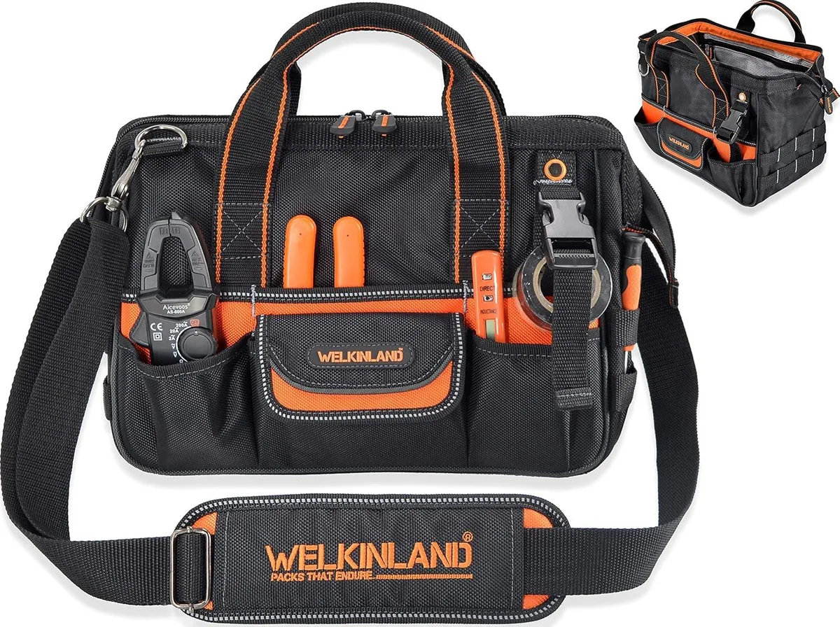 Orange-lined 13-inch ballistic fabric tool bag with 32 pockets and leather base