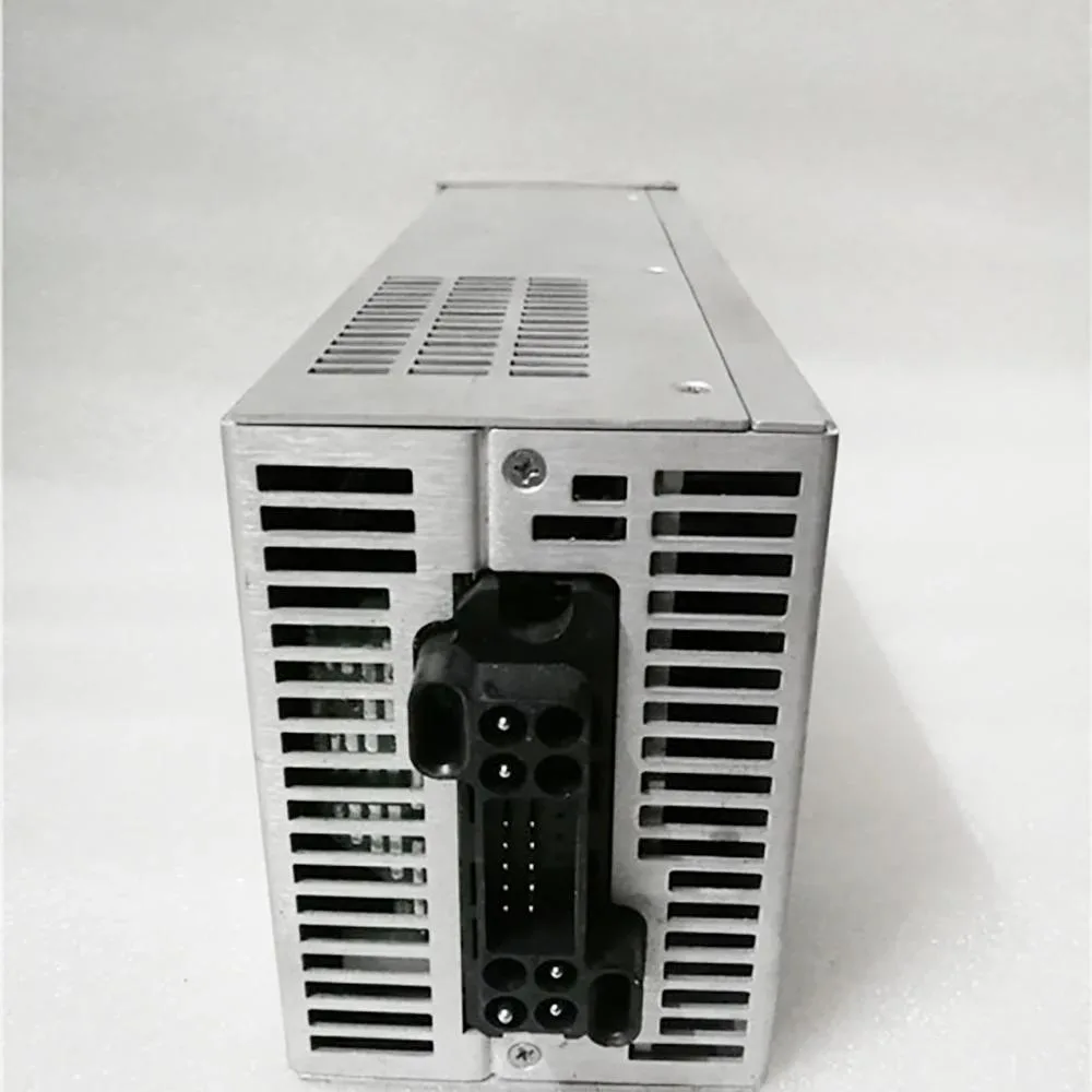 Rectangular metal power supply unit with ventilation slots