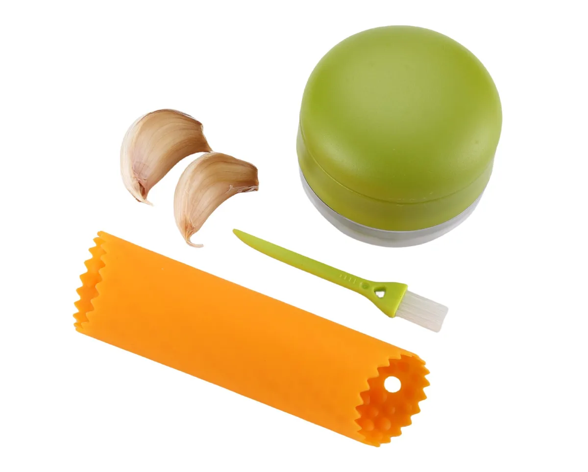 Garlic press set with peeler, brush and storage container