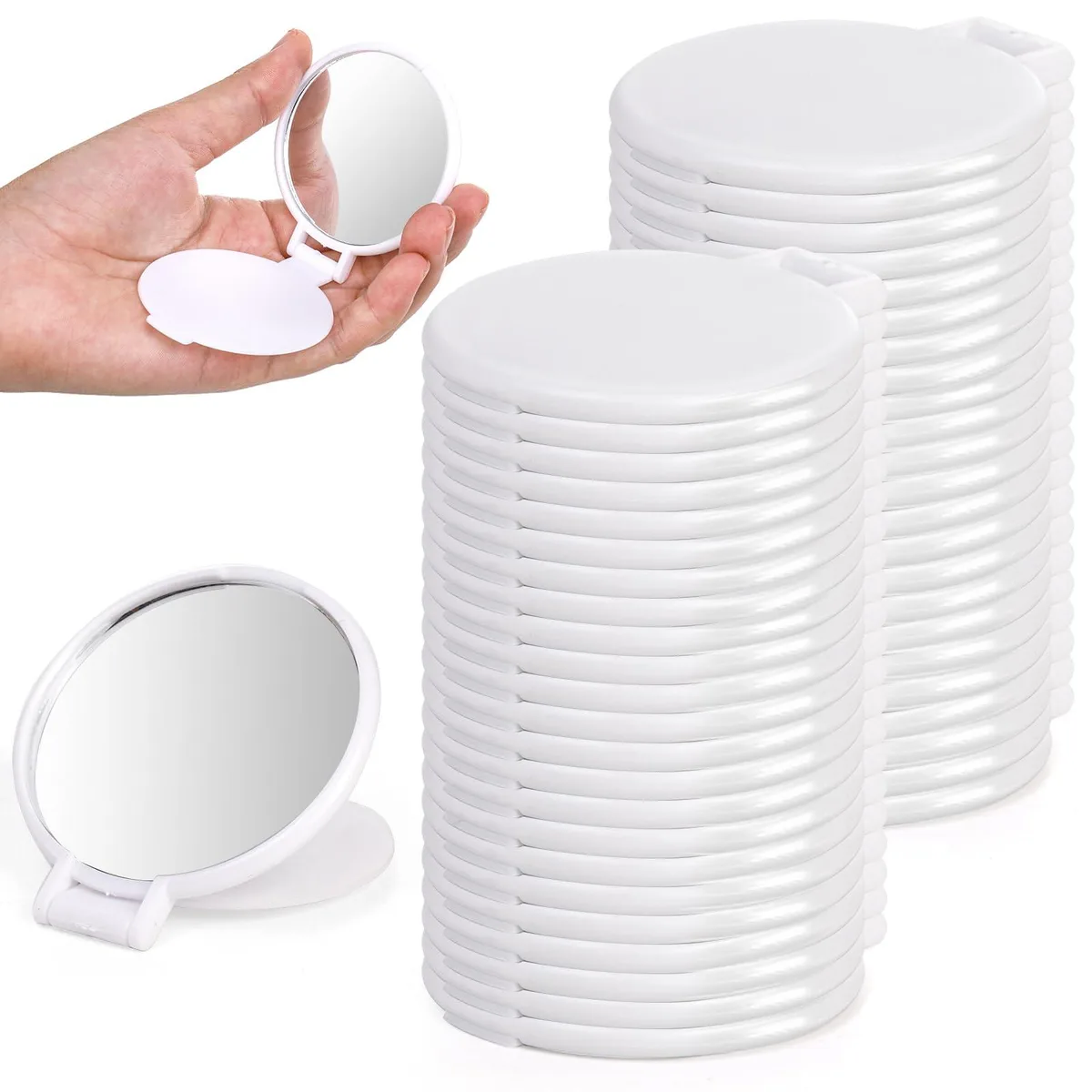 Fifty small round white plastic mirrors with flip covers shown stacked together