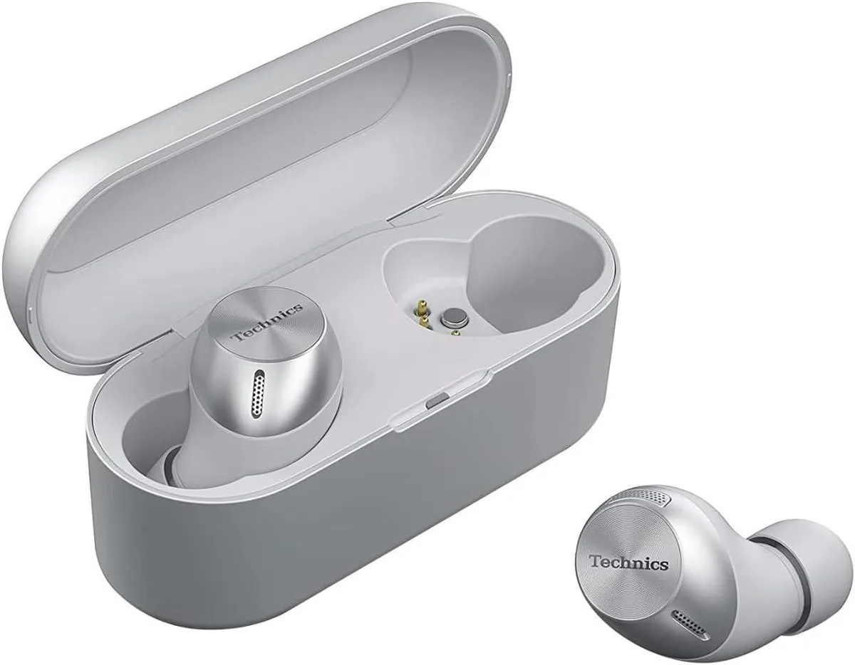 Silver true wireless earbuds in matching charging case
