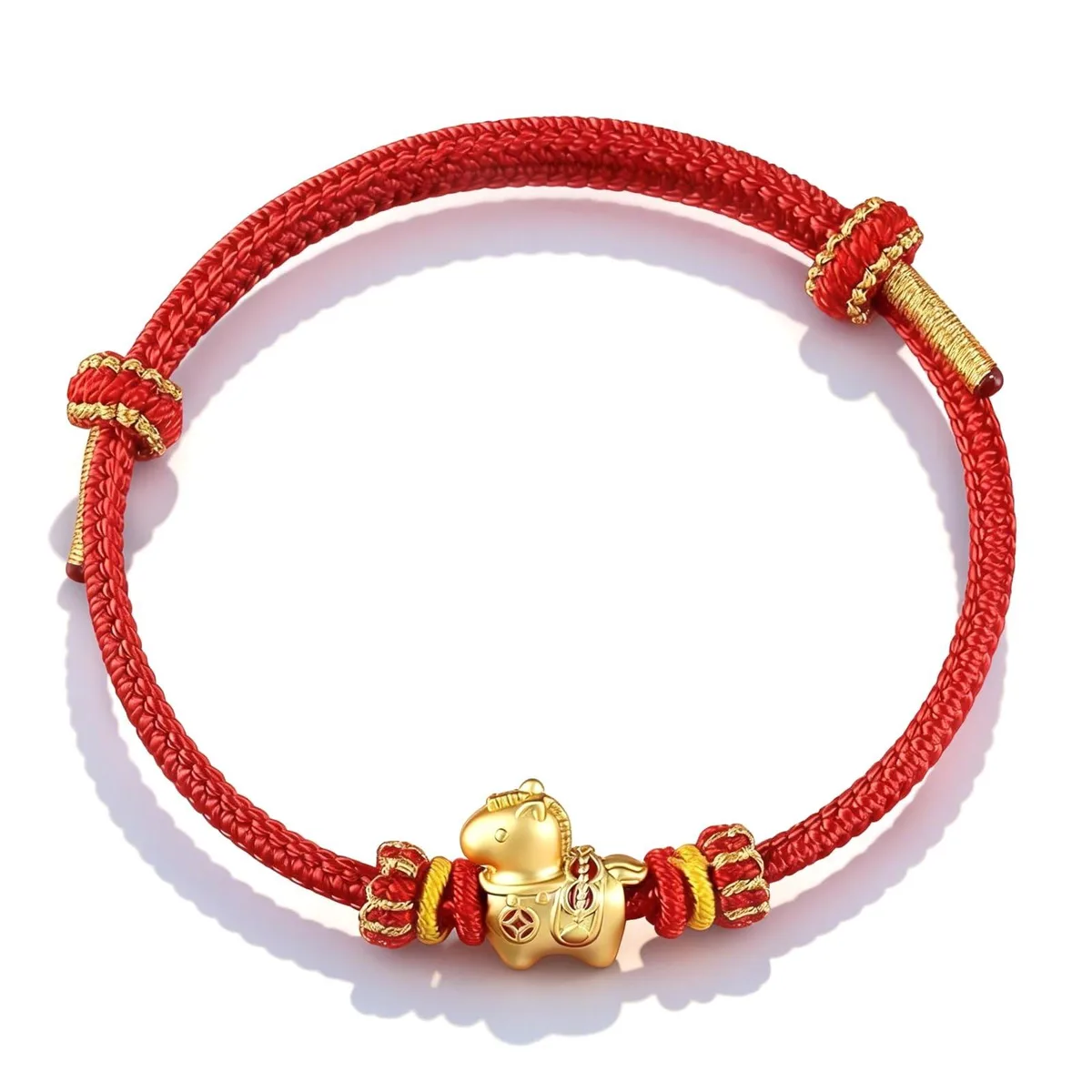 Red braided string bracelet with gold horse charm