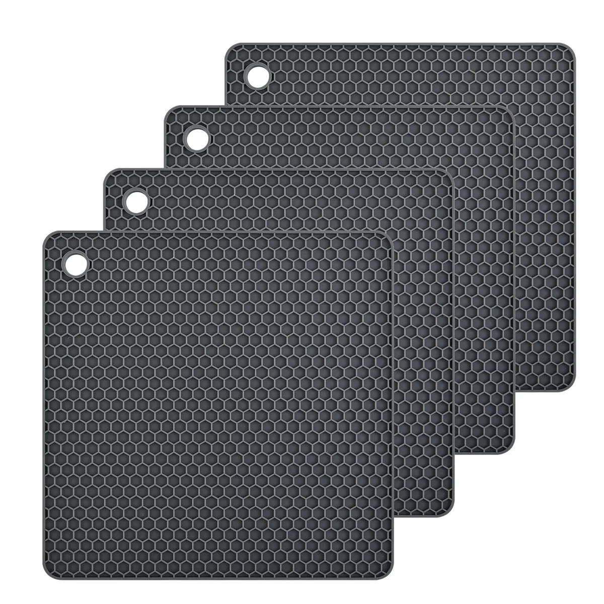 Four grey square silicone trivets with textured surface