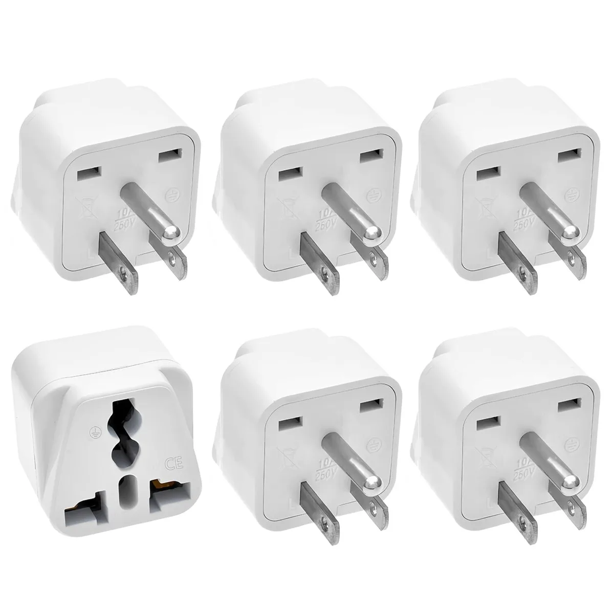 Six small white cube travel adapters with US prongs