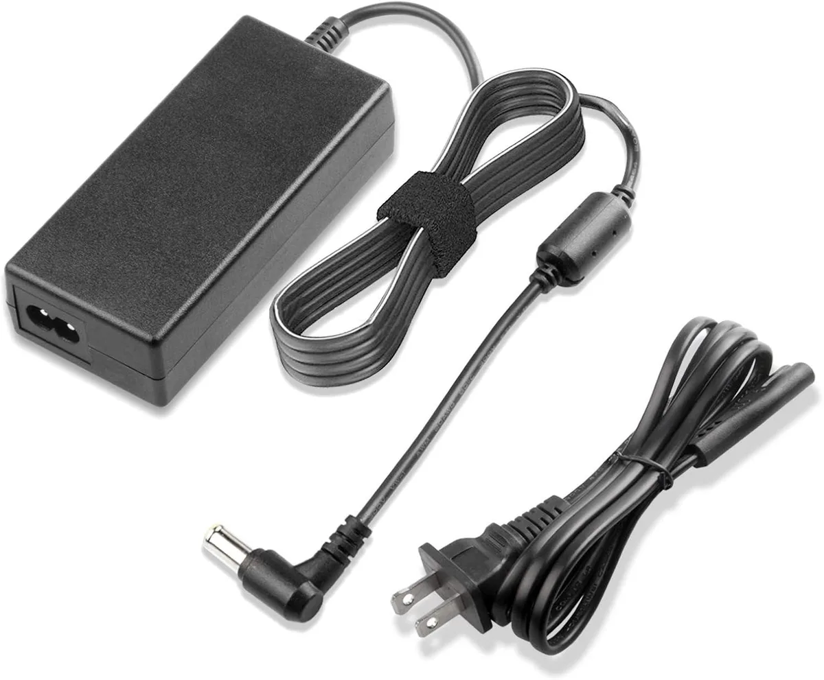 Compact black AC adapter with 6.0 by 4.4 mm barrel connector