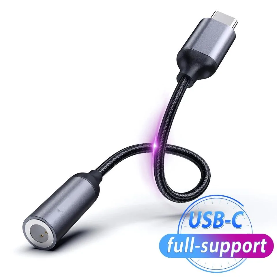 Small white USB-C to 3.5mm audio adapter with short cable