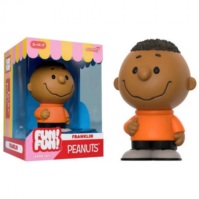 Vinyl Franklin figure in patisserie window box