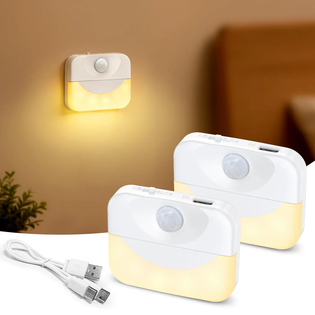 Two slim white rectangular lights with stick-on backs, USB charging cable included