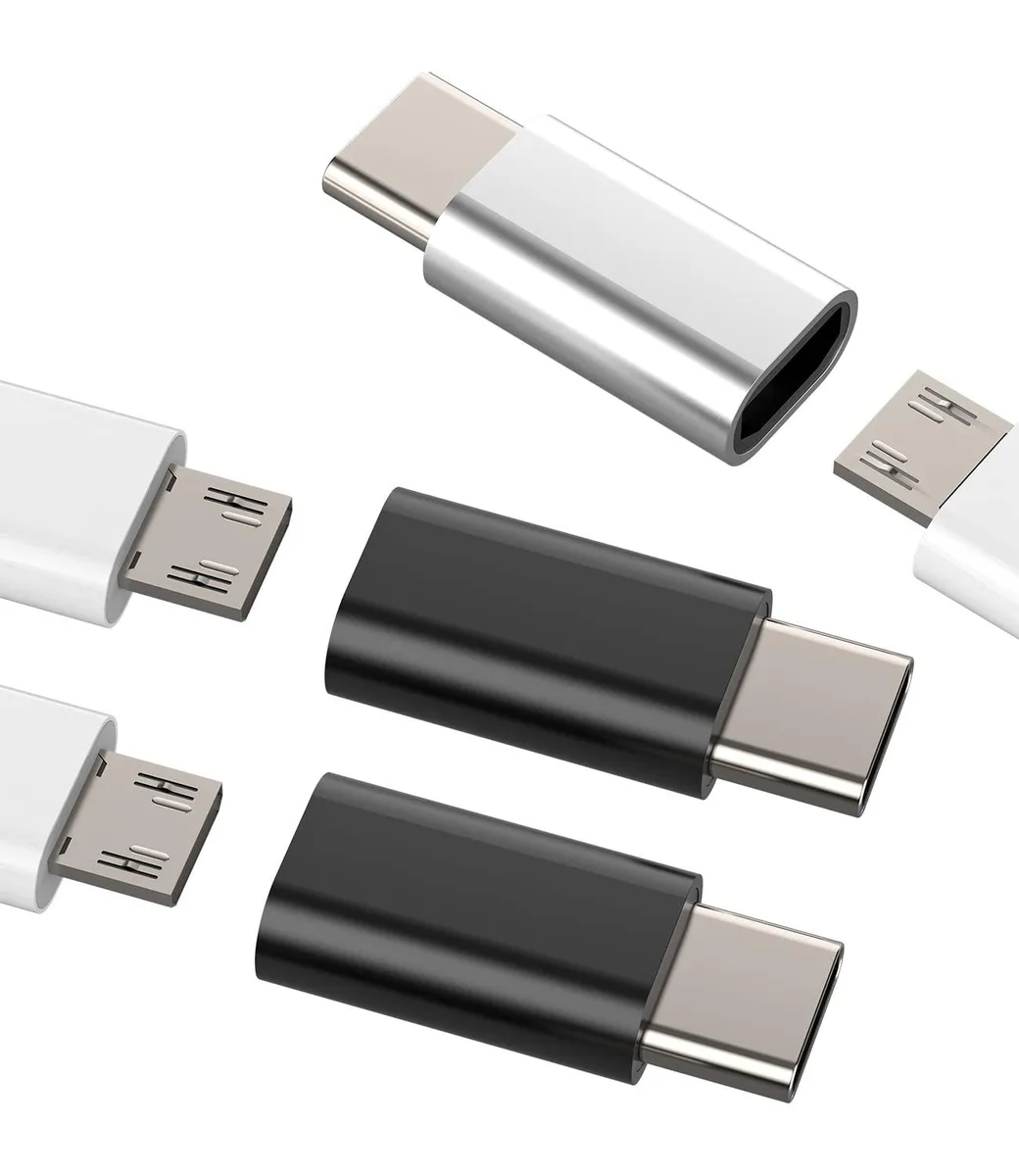 Three small adapters, two black and one silver, each with a Micro USB female port on one end and a USB-C male plug on the other
