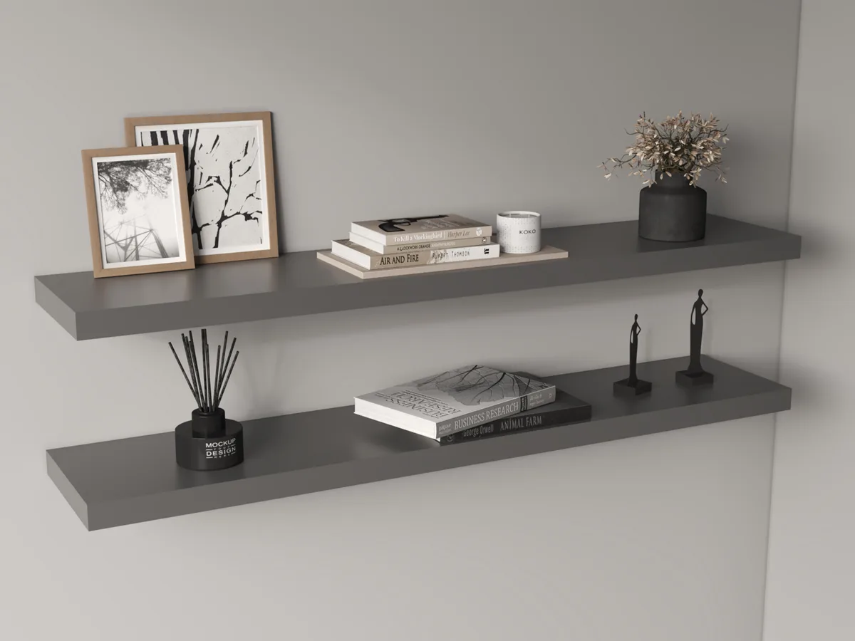 Two matte grey floating shelves mounted on a wall, hidden brackets, clean rectangular form