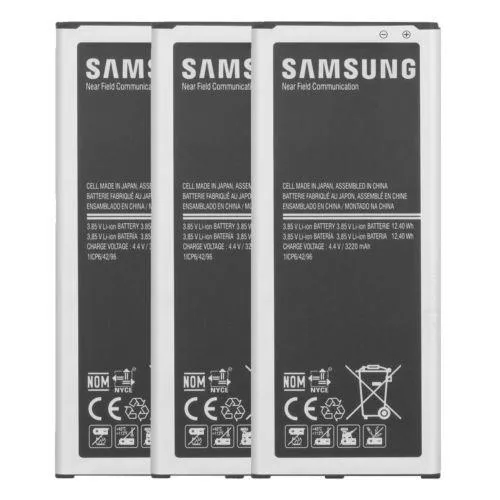 Three white Samsung wall chargers with micro USB cables