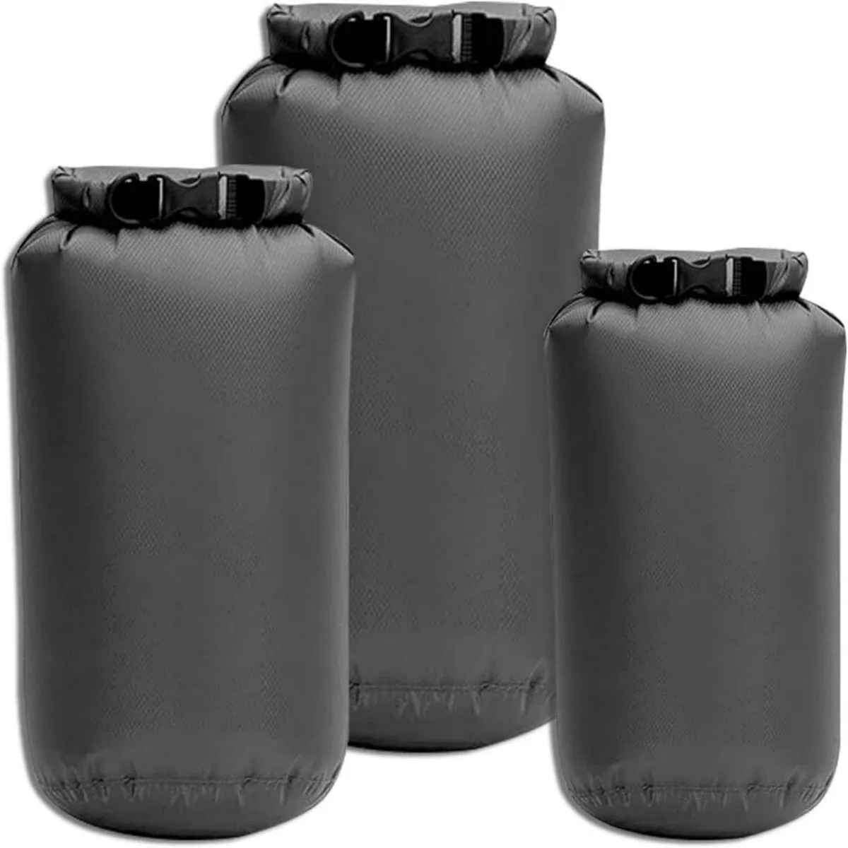 Three grey polyester dry bags rolled up together