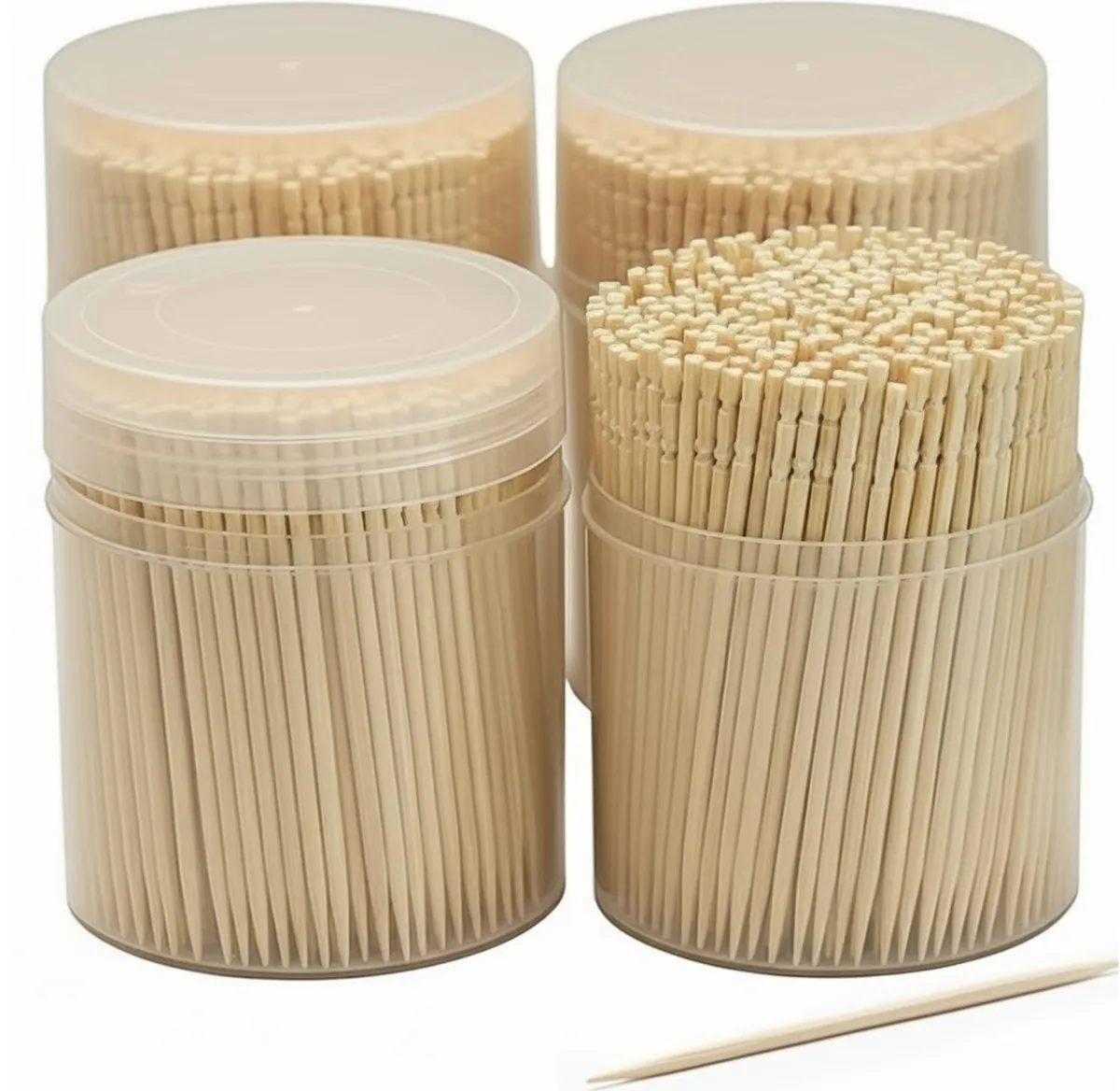 Four countertop containers of bamboo toothpicks