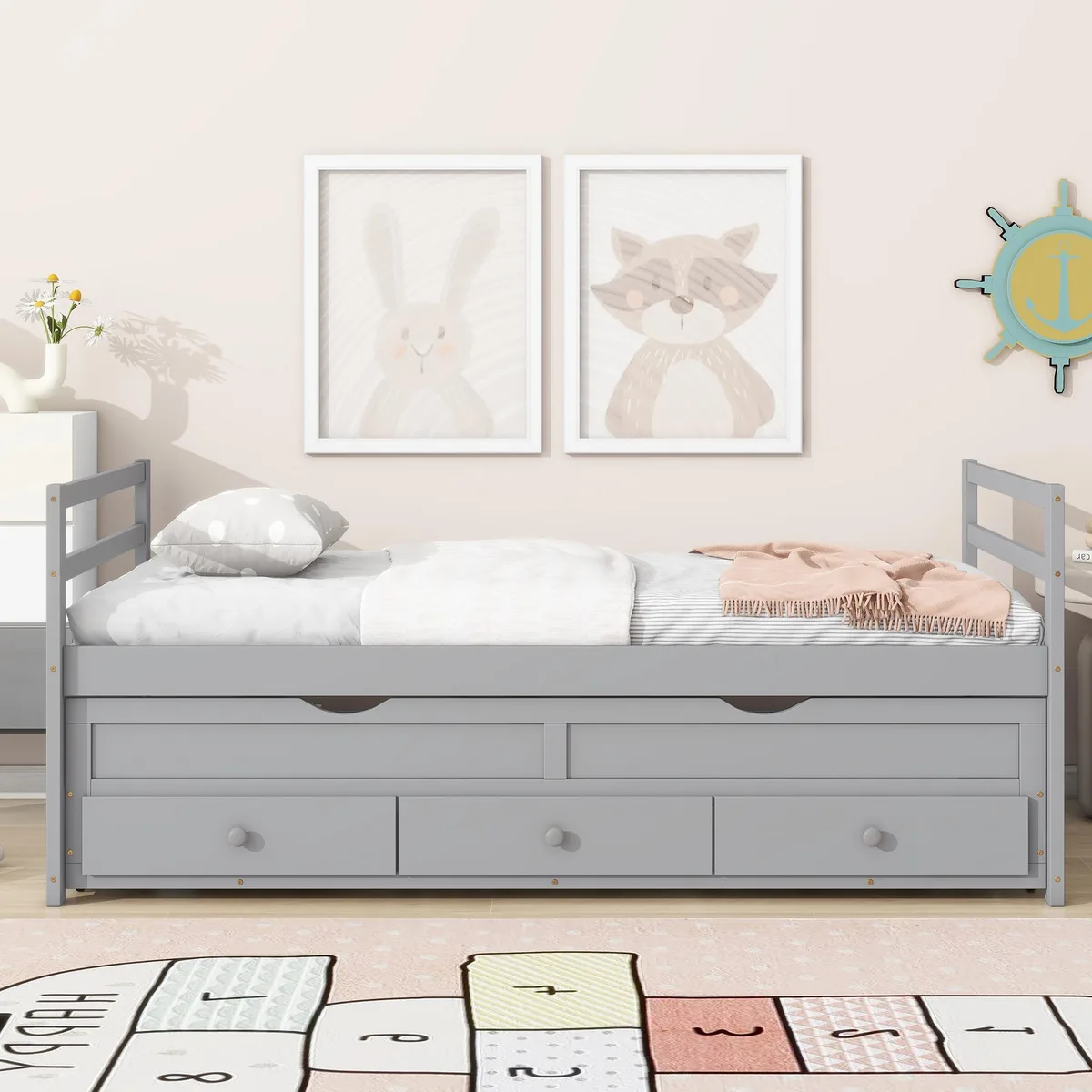 Twin pine bed with grey finish, headboard, footboard, pull-out trundle and three drawers