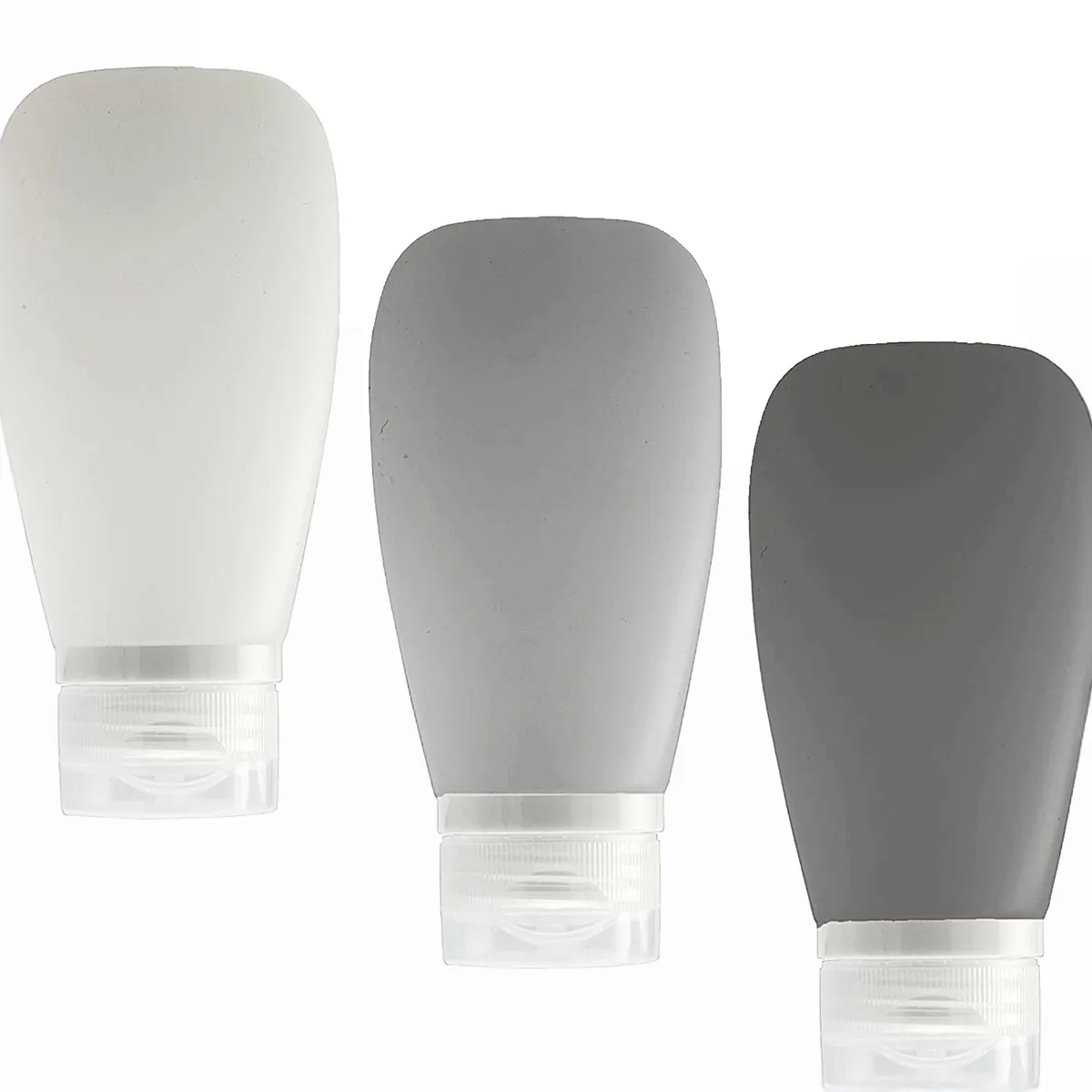 Three matte silicone squeeze bottles in black, grey and white with flip caps