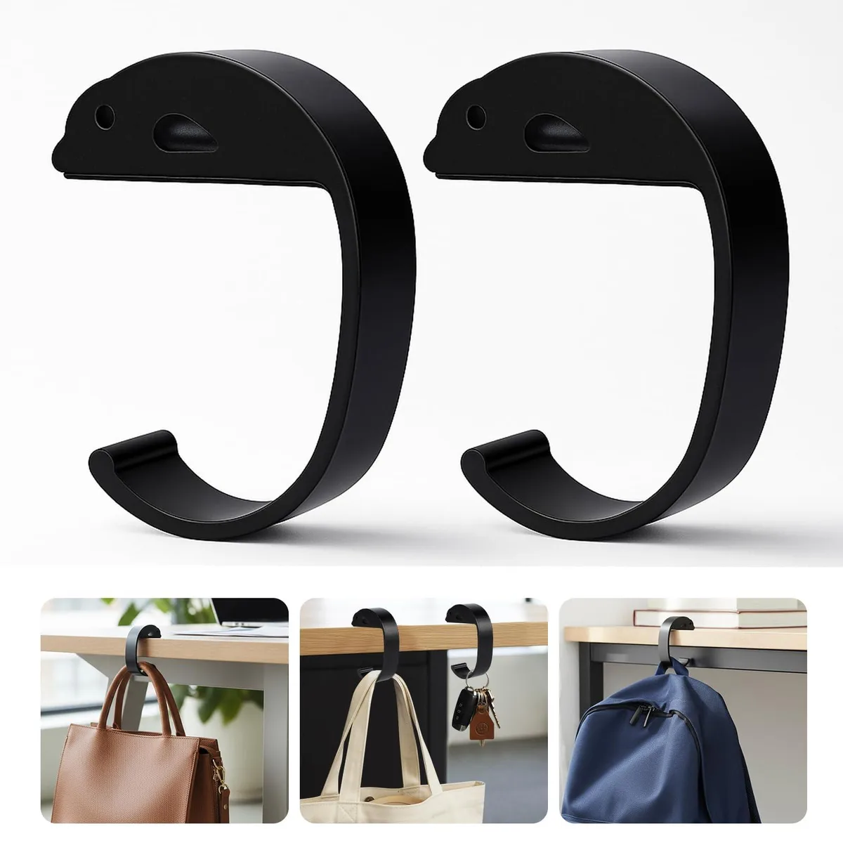 Two silver purse hooks with silicone pads on a table edge
