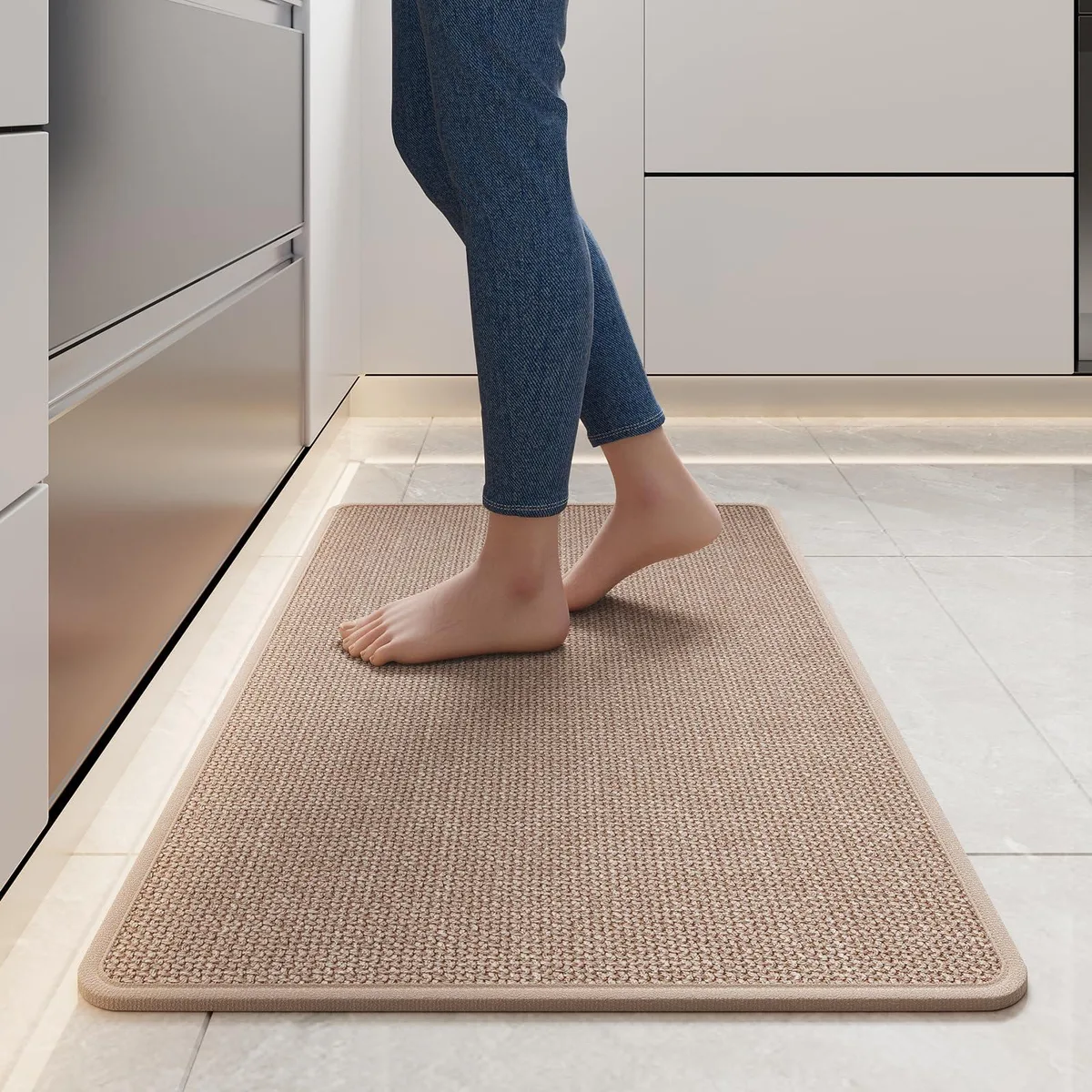 Rectangular brown runner rug with textured surface and rubber backing, 17 by 30 inches