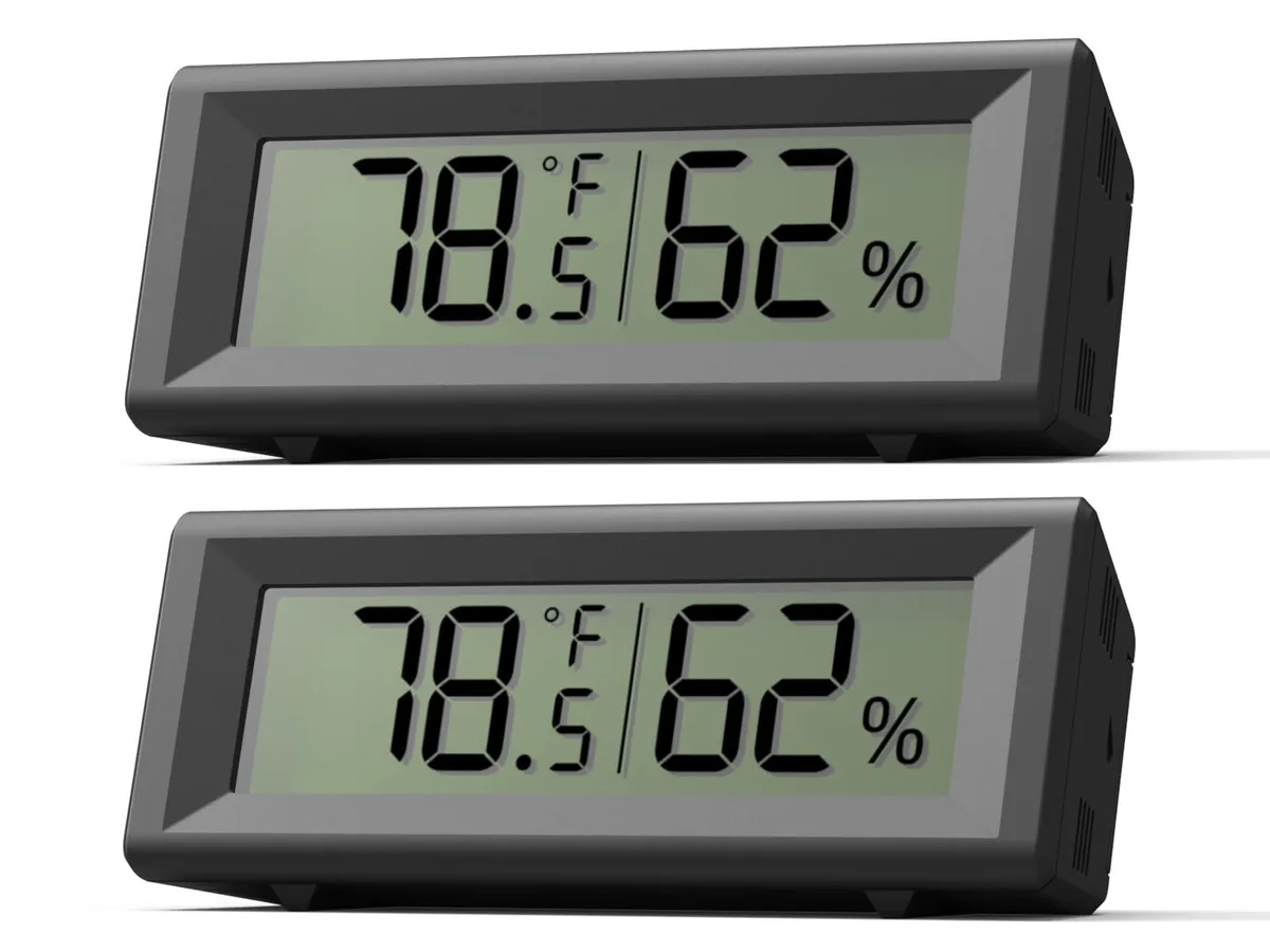 Black rectangular hygrometer thermometer with 2.4 inch LCD screen tilted at 18 degrees