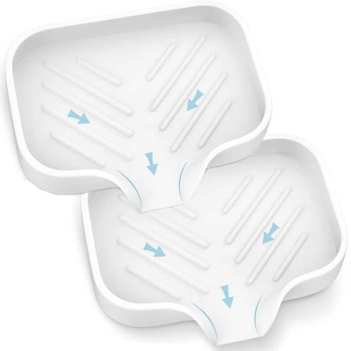 Two white flexible silicone soap trays with drainage channels and raised ridges