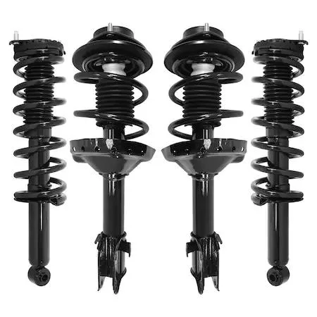 Four silver strut assemblies with black coil springs and top mounts for Subaru Outback