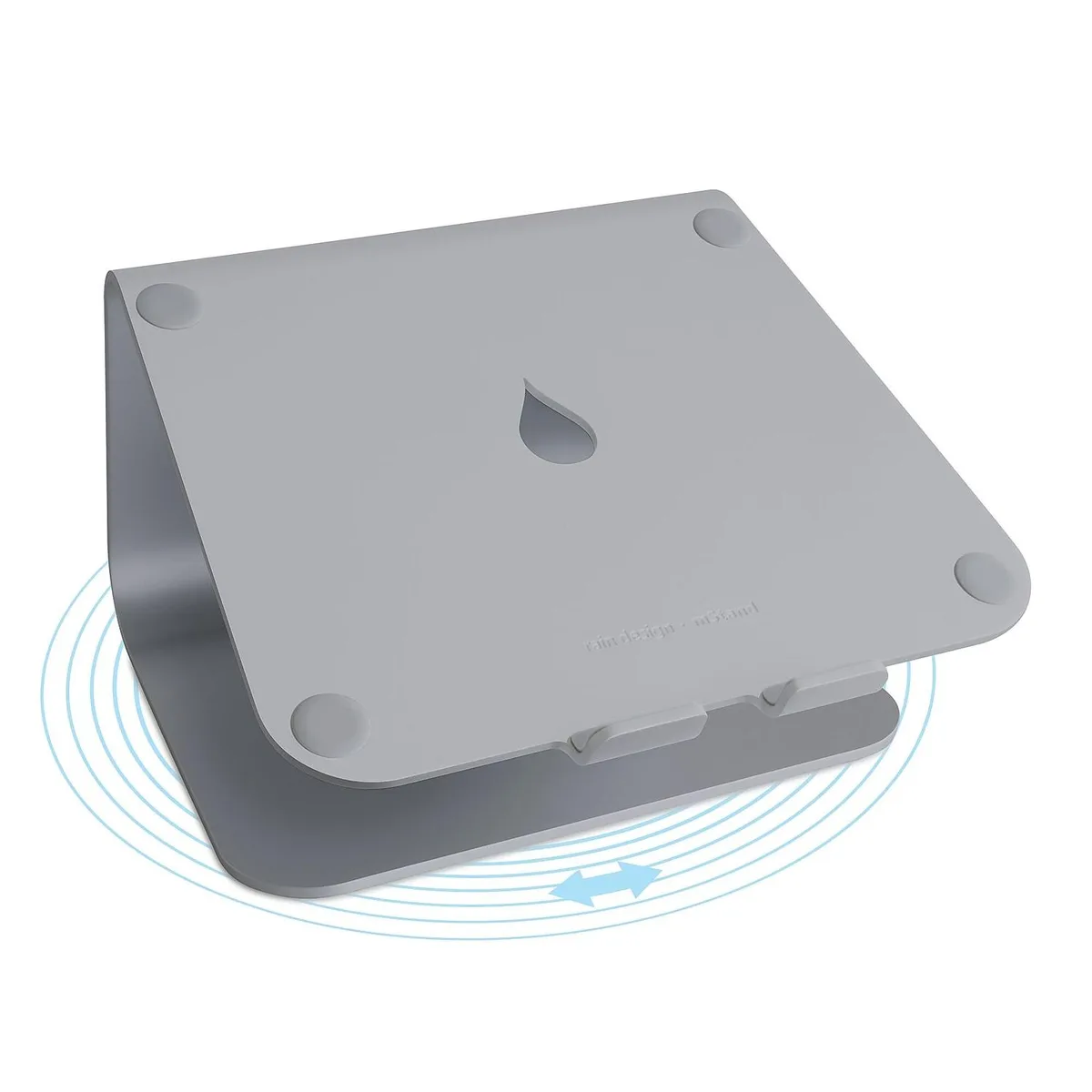 Space gray aluminum laptop stand with circular swivel base, tilted platform, cable cutout and keyboard storage space