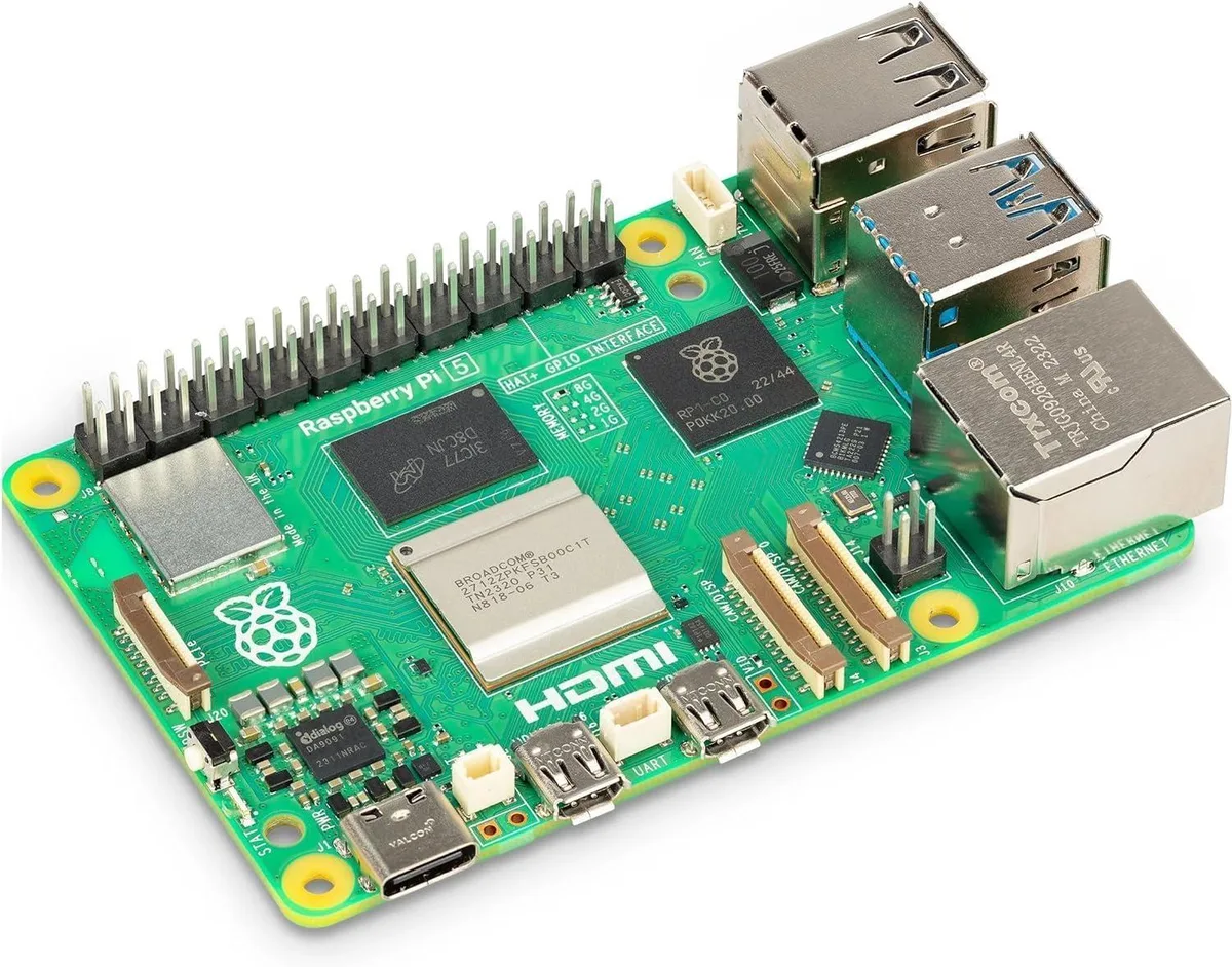 Green circuit board with silver ports and chips