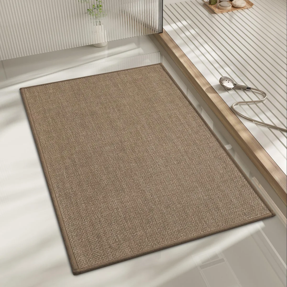 Rectangular dark beige bath mat, 24 by 17 inches, ultra-thin with non-slip backing