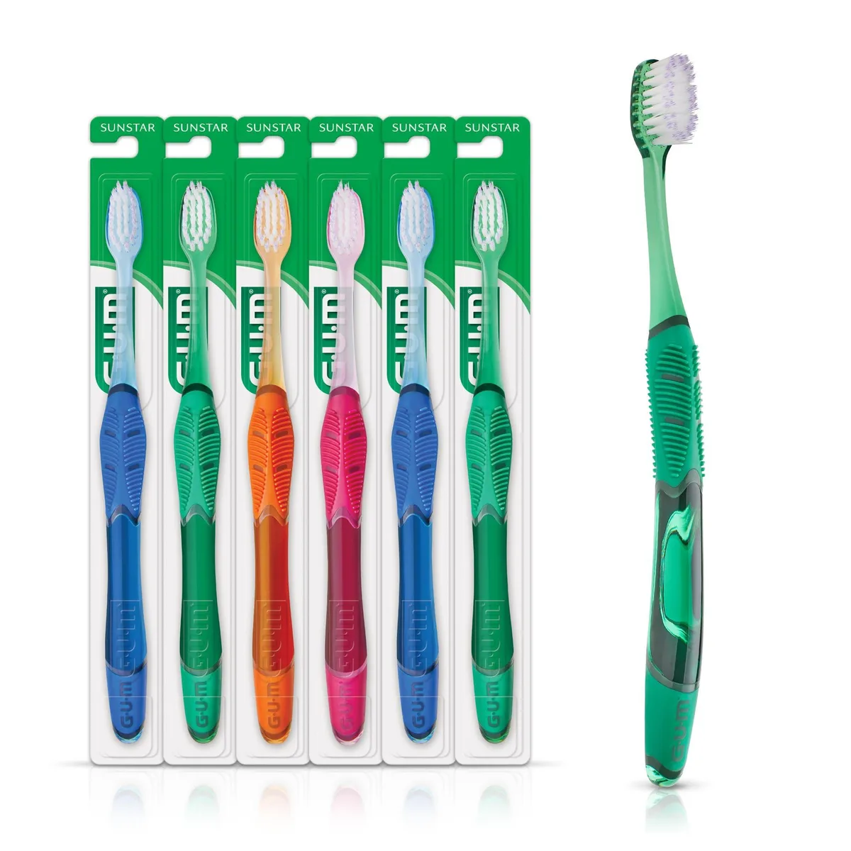 Six white manual toothbrushes with compact heads and soft tapered bristles, ergonomic quad-grip handles