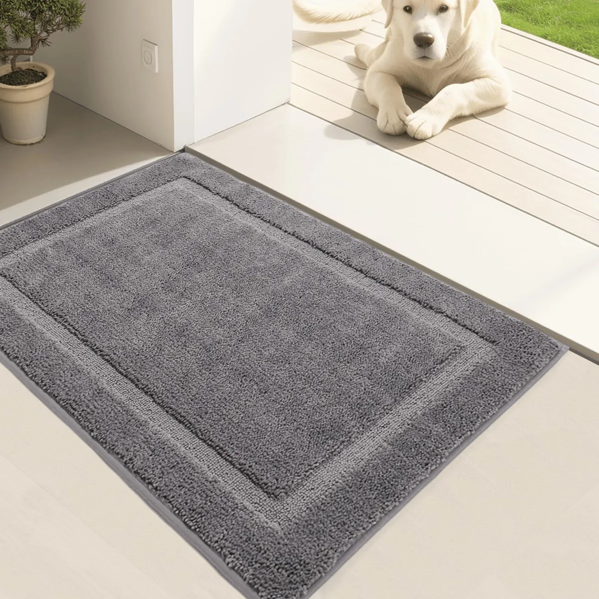 Grey rectangular door mat with geometric pattern and low-profile absorbent surface