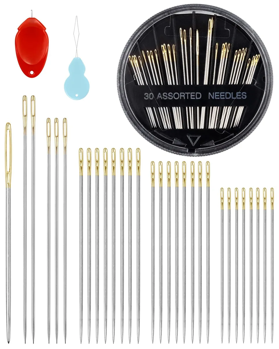 Round plastic case holding thirty stainless steel needles in six lengths and two threaders