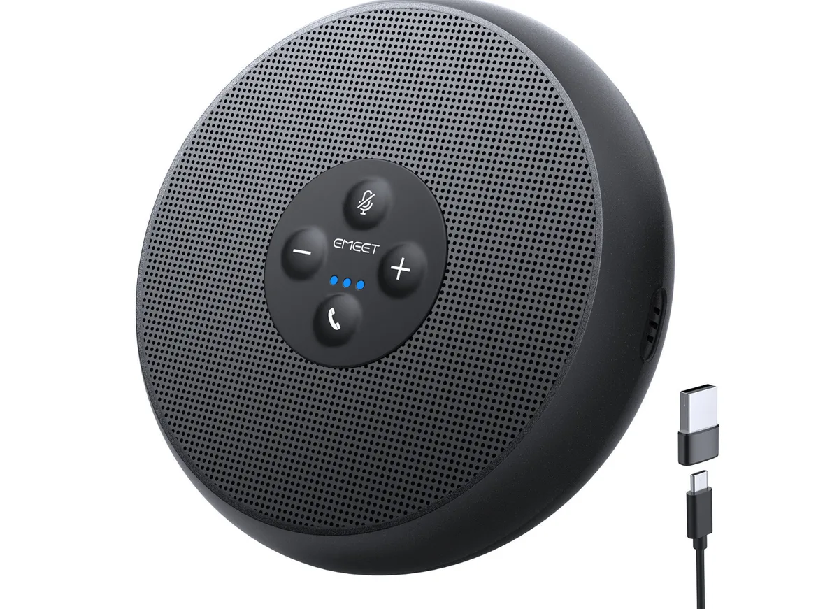 Small round USB speakerphone, matte black finish, 4.4 inches across, 1.4 inches thick, USB-C cable attached