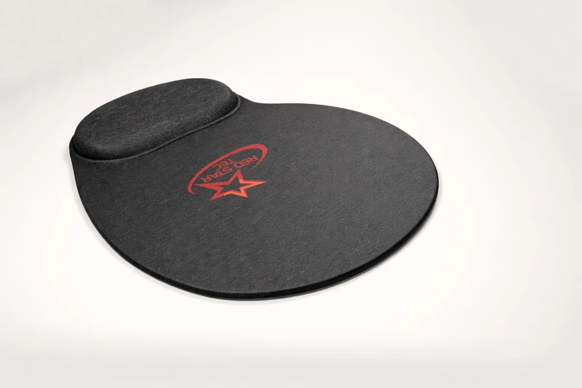 Black ergonomic mouse pad with integrated wrist rest, neoprene surface, compact rectangular shape