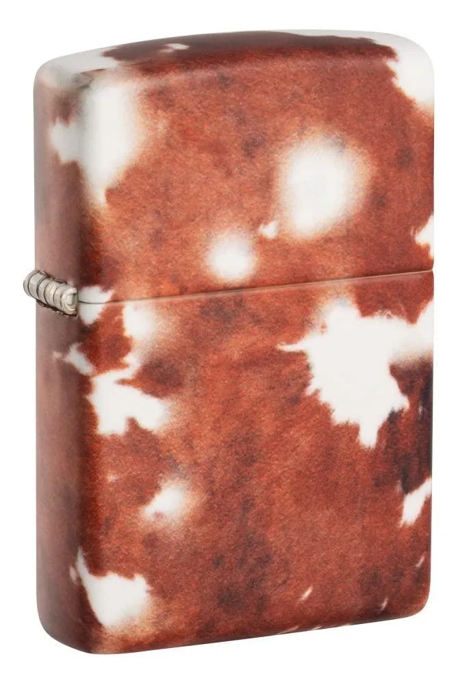Zippo lighter with brown and white cow print design