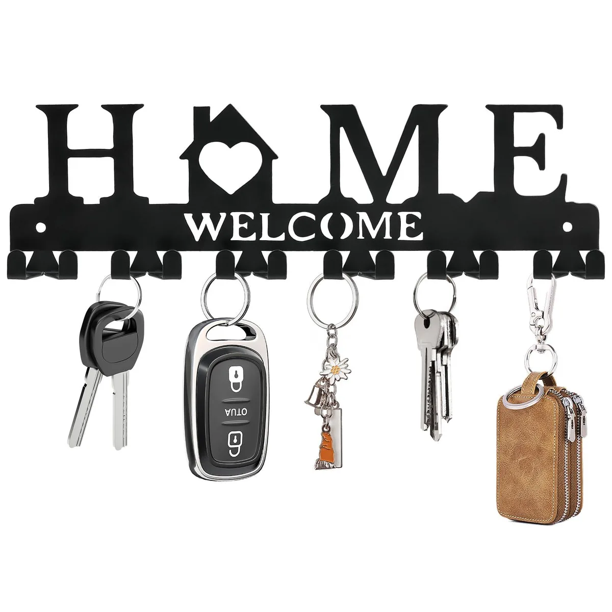 Black metal wall-mounted key holder with twelve hooks and Welcome Home lettering