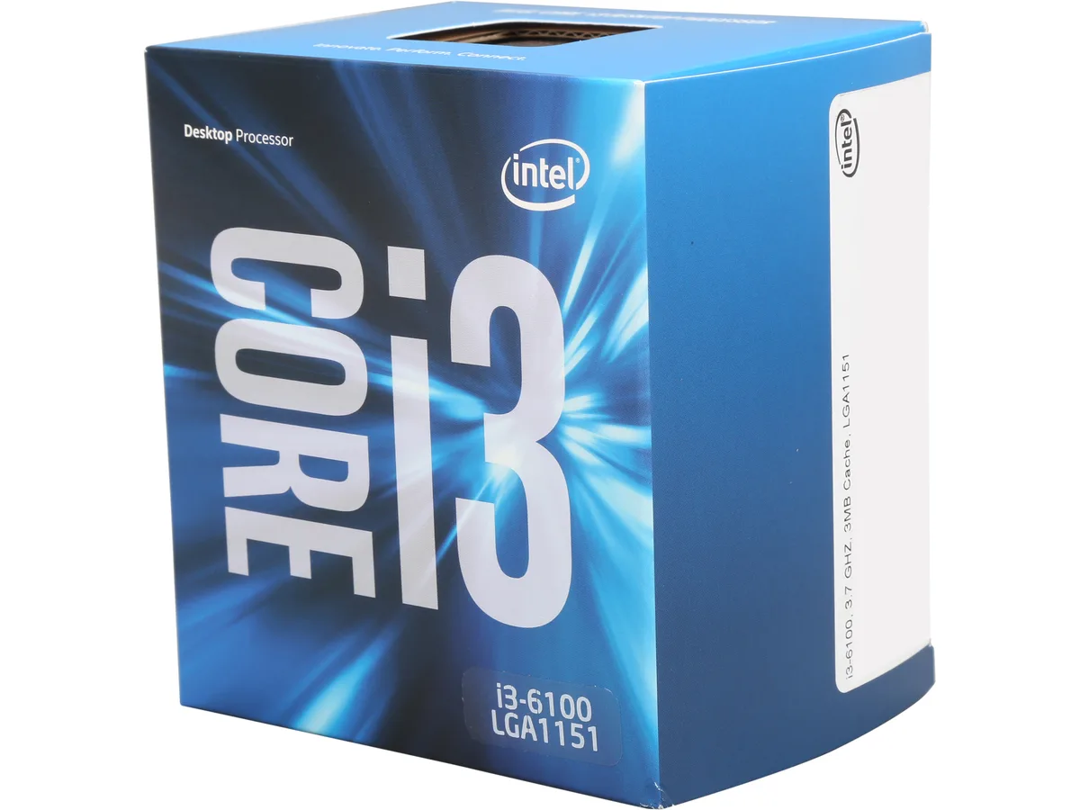 Small square CPU chip with gold contacts and silver heat spreader, branded Intel Core i3-6100