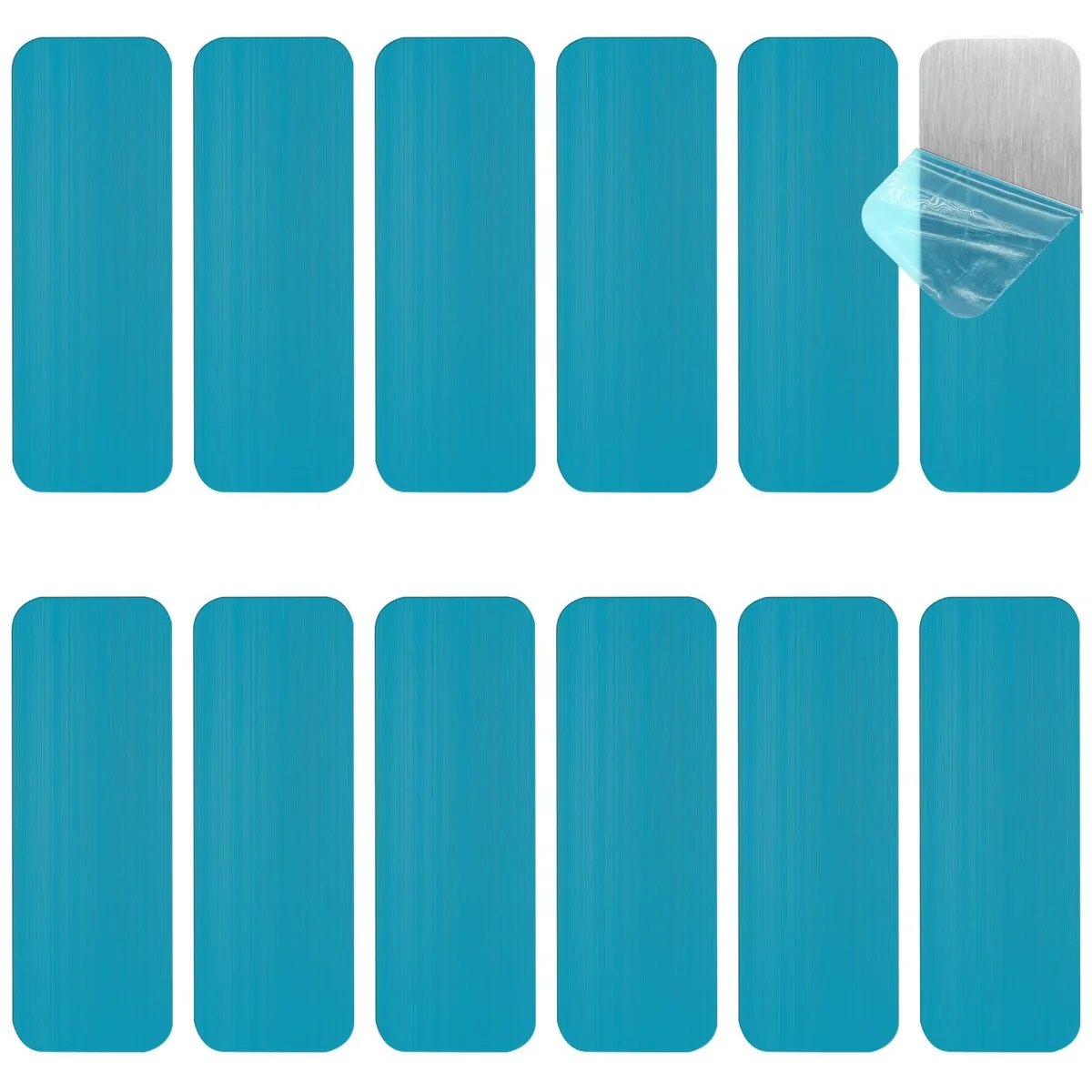 Twelve small rectangular magnetic iron strips with adhesive backing on a plain surface