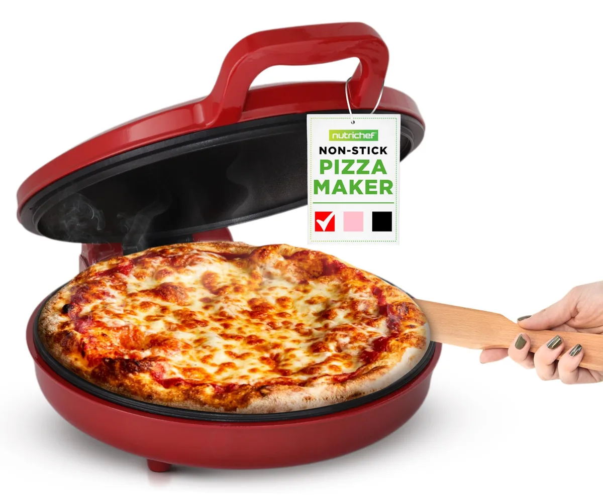 Red countertop pizza maker with non-stick cooking surface and cool-touch handles