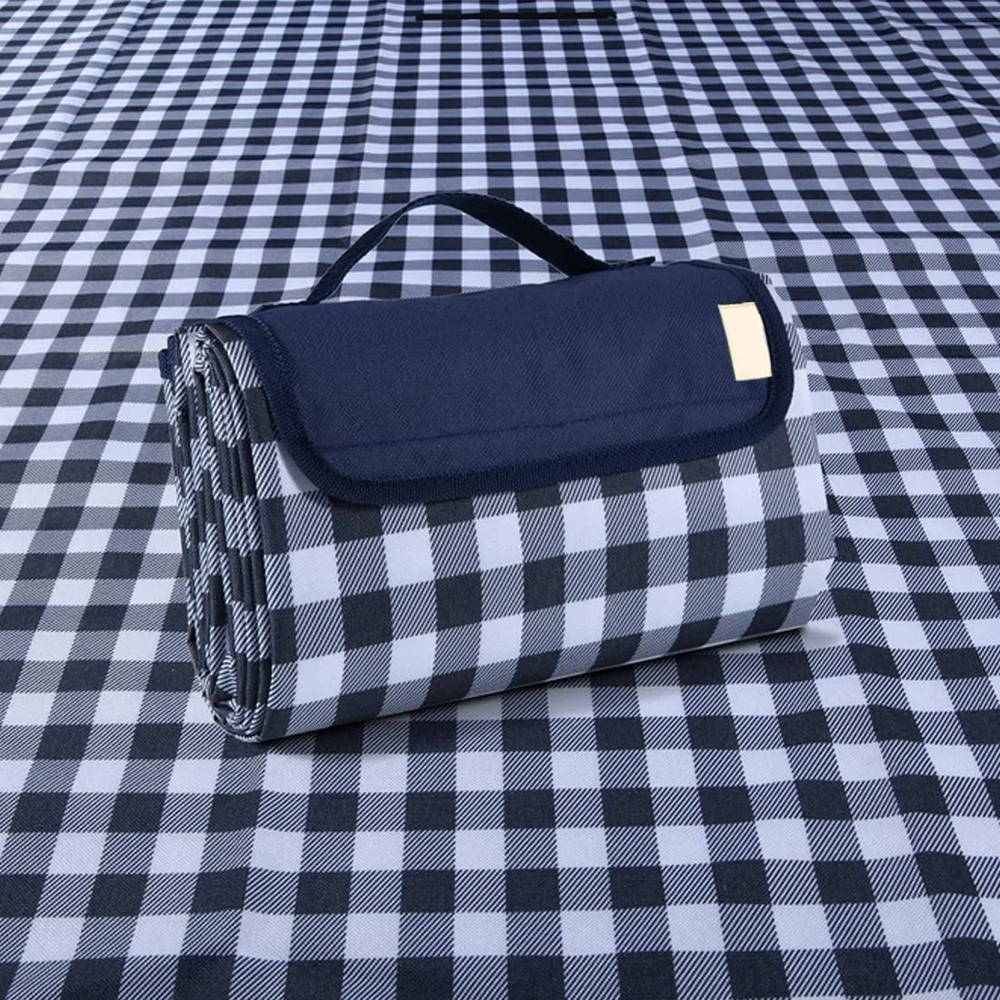 Navy blue foldable picnic blanket 80 by 60 inches with built-in handle