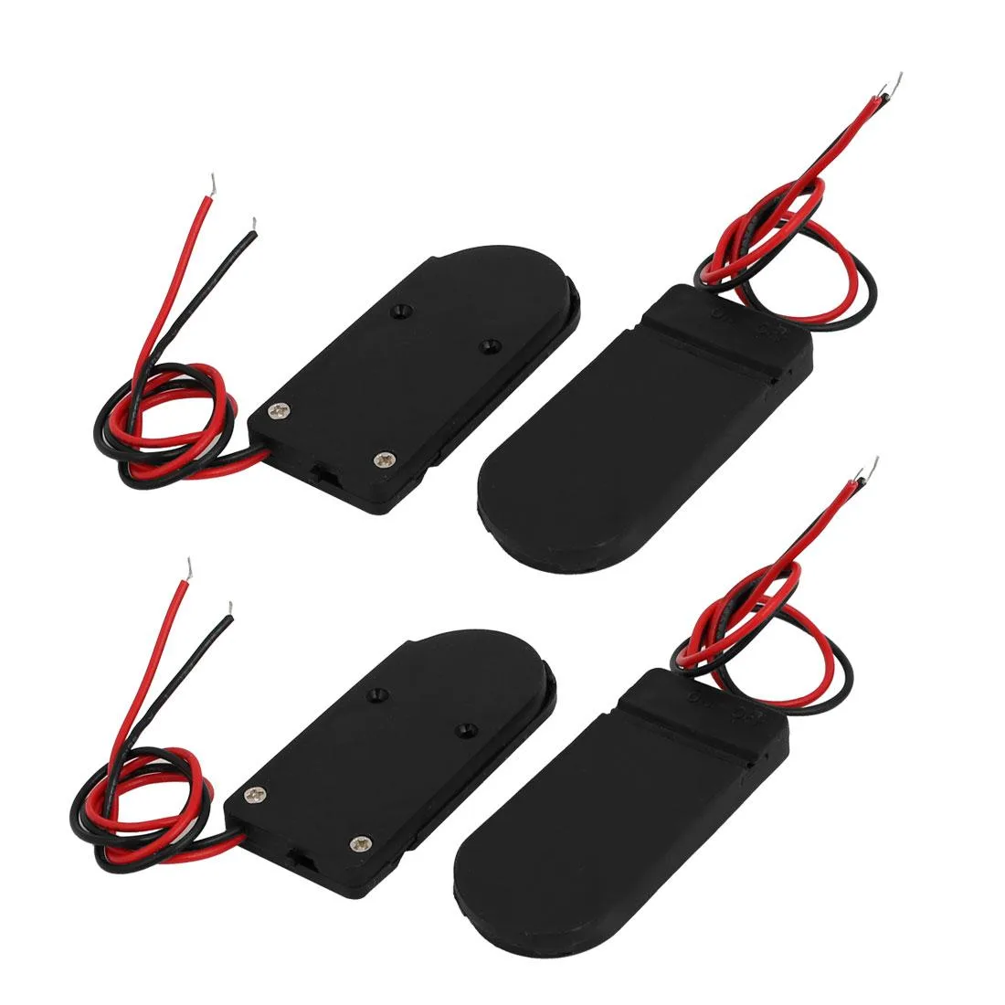 Four black plastic coin battery holders with metal contacts and on-off switches