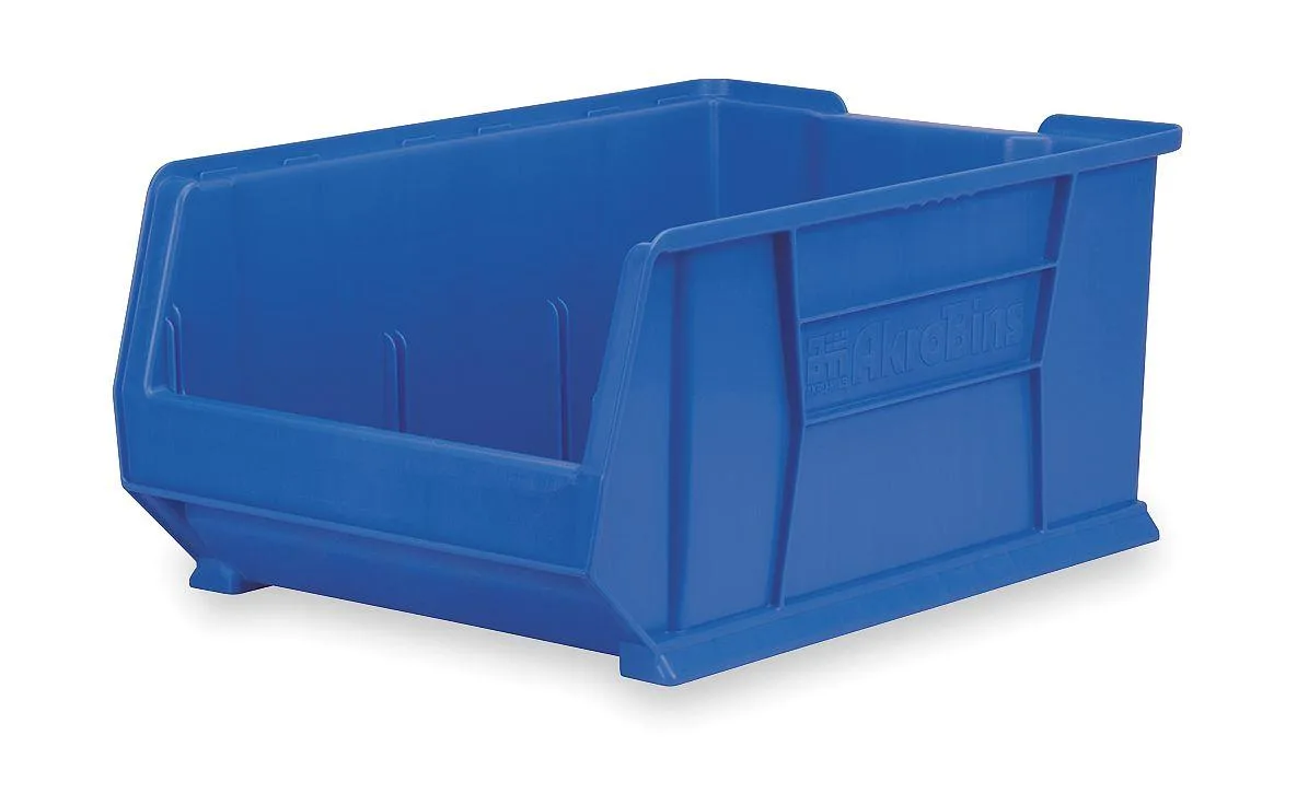 Blue industrial polymer storage bin with label area and divider slots