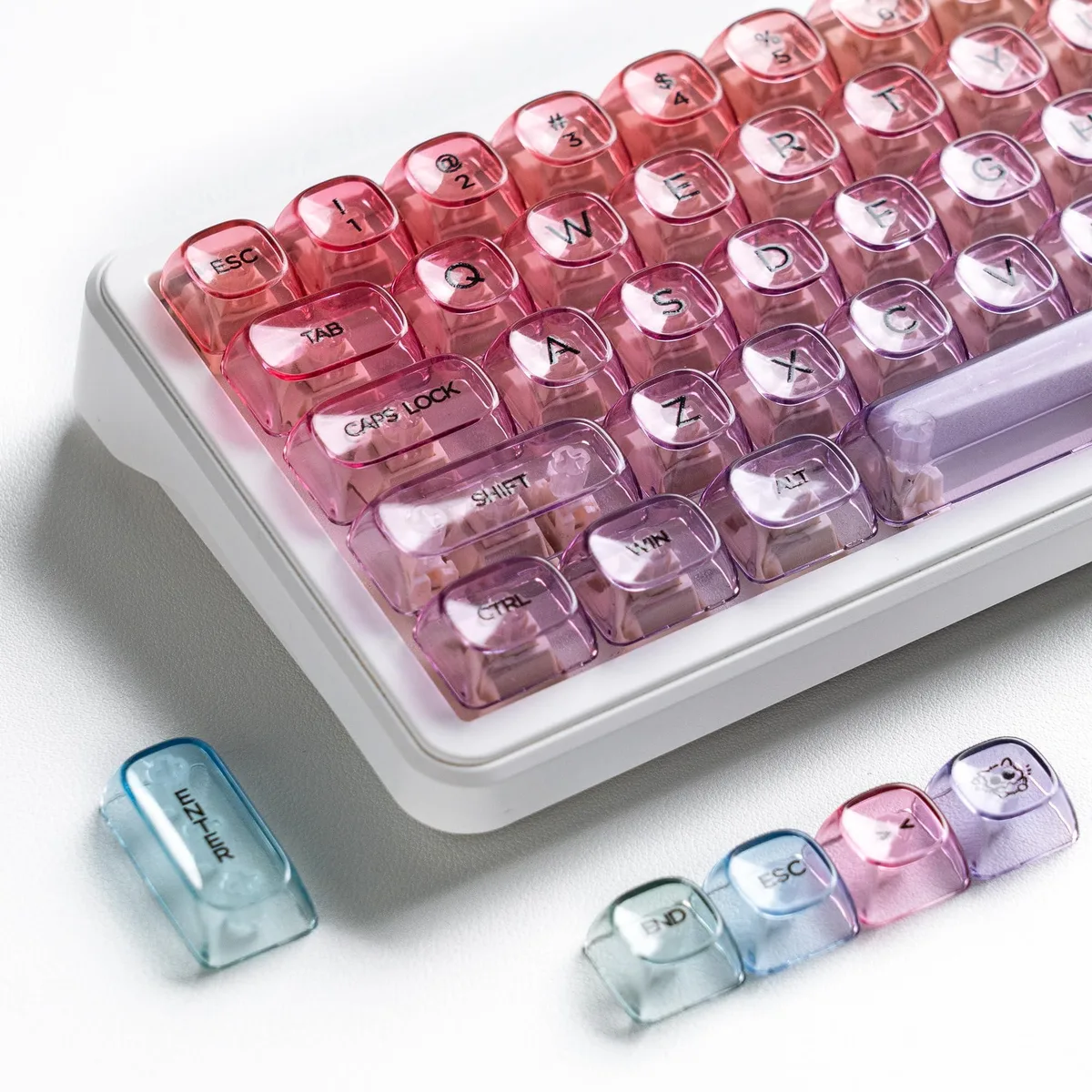 125 translucent purple keycaps in MOA profile on a flat surface