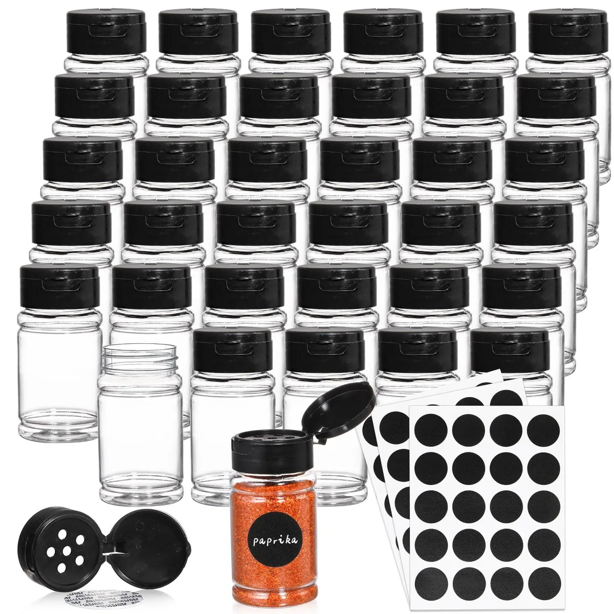 Thirty-six clear 80 ml spice bottles with black shaker lids and chalkboard labels