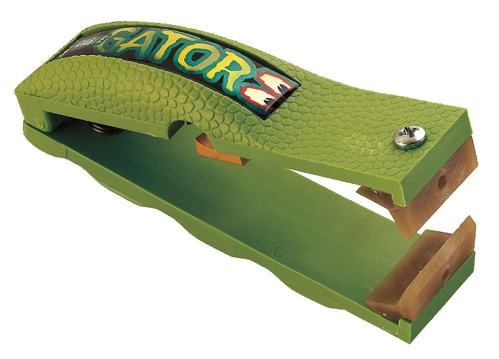 Green plastic hand tool with reversible teeth for cable conductor cleaning and beveling