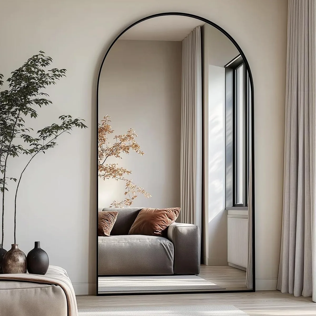 Arched full-length mirror 76 by 34 inches black aluminum frame